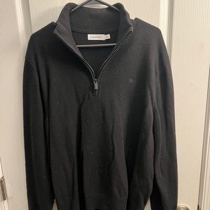 Black quarter zip sweater. Calvin Klein in size L.